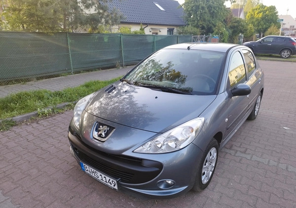 Peugeot 206 plus cena 11900 przebieg: 99875, rok produkcji 2009 z Szczecin małe 352